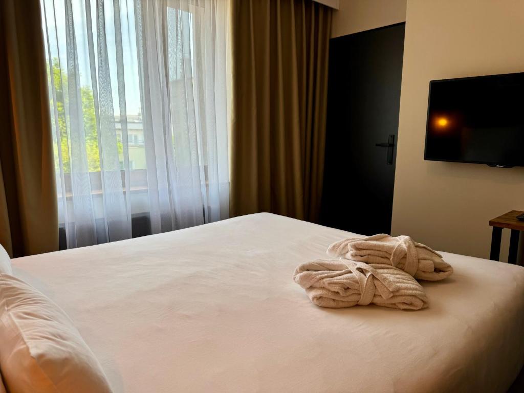 Postel nebo postele na pokoji v ubytování Amber Blue Wellness & SPA