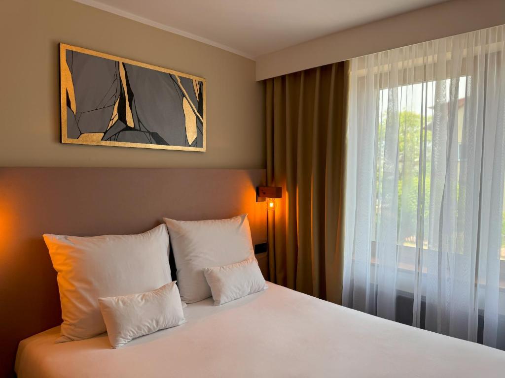 Postel nebo postele na pokoji v ubytování Amber Blue Wellness & SPA