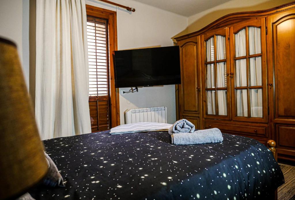 Postel nebo postele na pokoji v ubytování L'Amagatall de Talarn, casa per a compartir