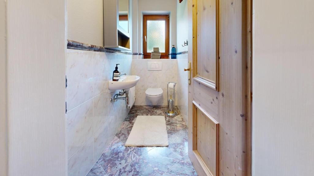 Kúpeľňa v ubytovaní Ferienhaus Chalet Kitzalp