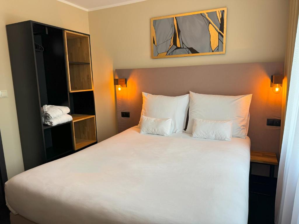 Postel nebo postele na pokoji v ubytování Amber Blue Wellness & SPA