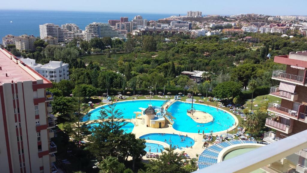 a view of a large swimming pool in a city at Minerva909 in Benalmádena