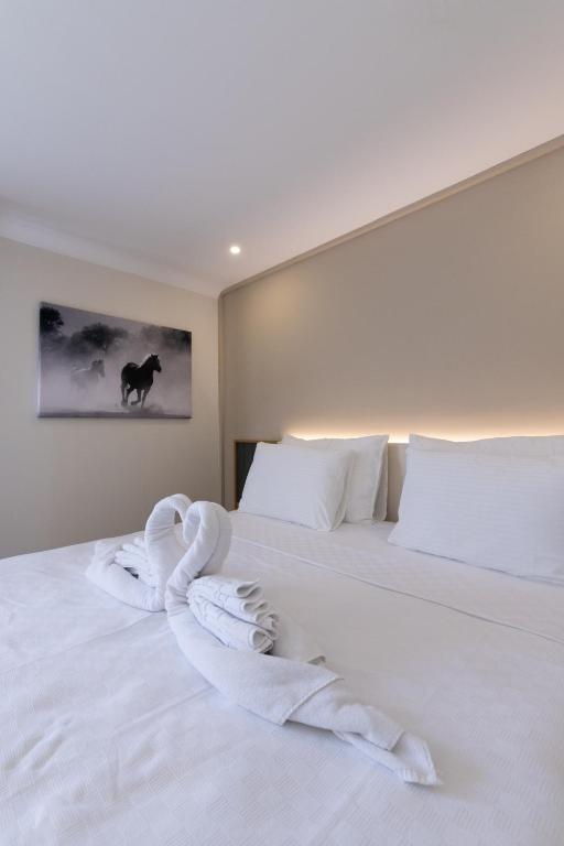 Postel nebo postele na pokoji v ubytování Three Points Hotel