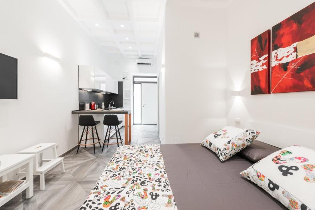 Кровать или кровати в номере Dreams House Bari City Centre