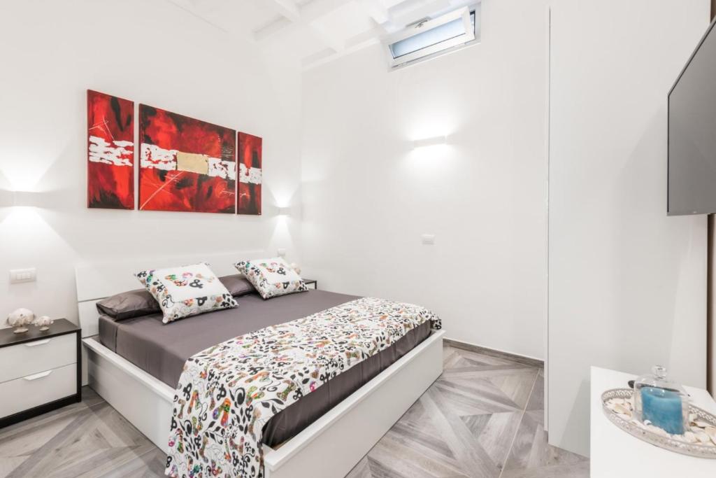 Кровать или кровати в номере Dreams House Bari City Centre