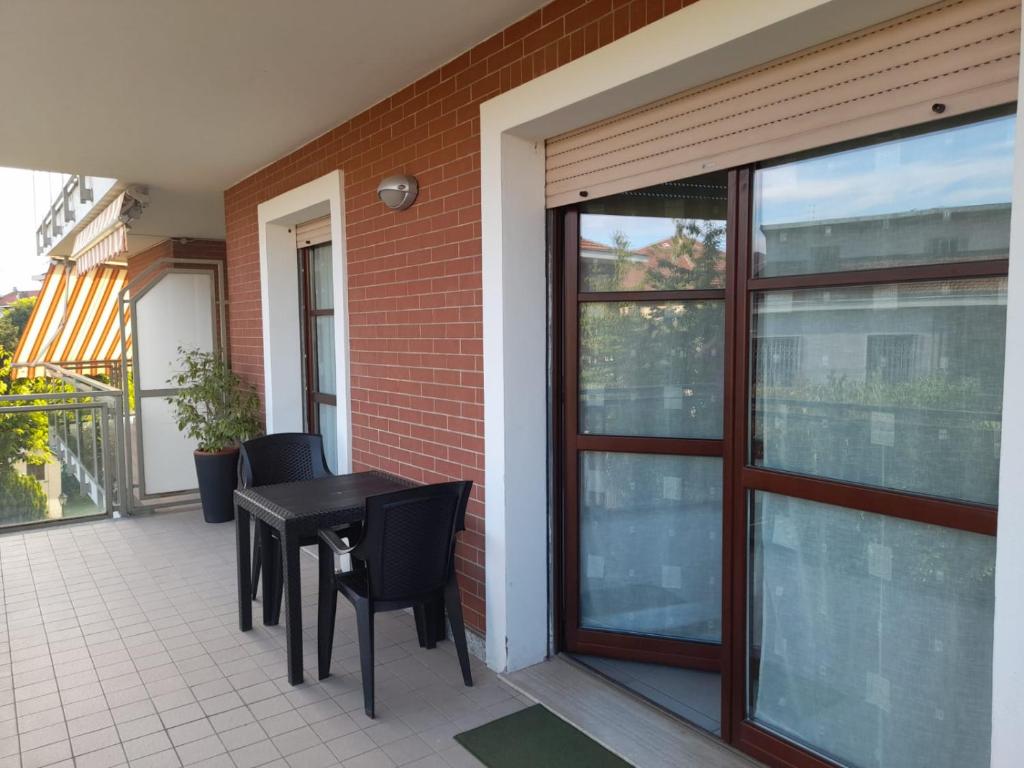 Balkón nebo terasa v ubytování Relax Preserasca-Modern Apartment-BORGO MERCATO-MONCALIERI