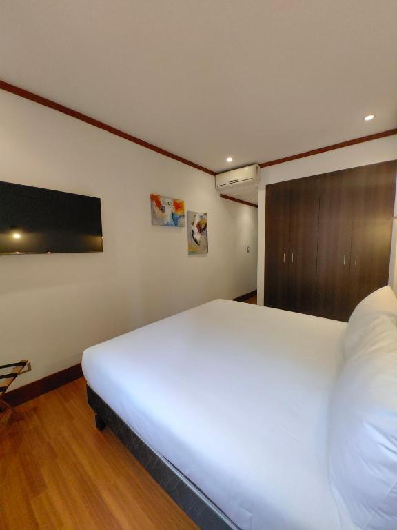 Postel nebo postele na pokoji v ubytování Concha y Toro 33 Hotel Boutique by Nobile