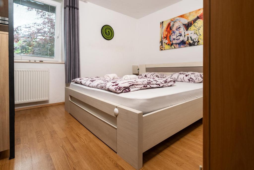 Postel nebo postele na pokoji v ubytování Hostel Mama Minka