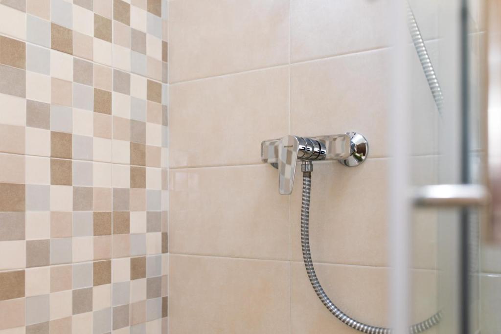 Kúpeľňa v ubytovaní Apartmani Pina