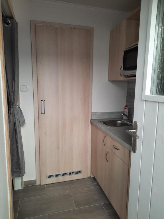 Kuchyň nebo kuchyňský kout v ubytování Apartmán u Bouře
