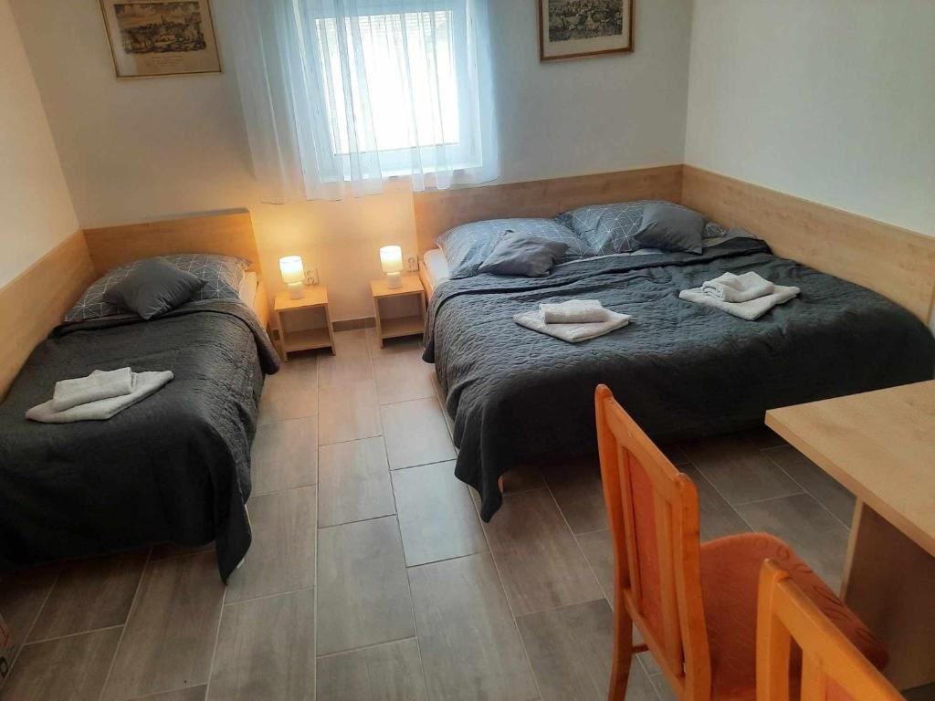 Postel nebo postele na pokoji v ubytování Apartmán u Bouře