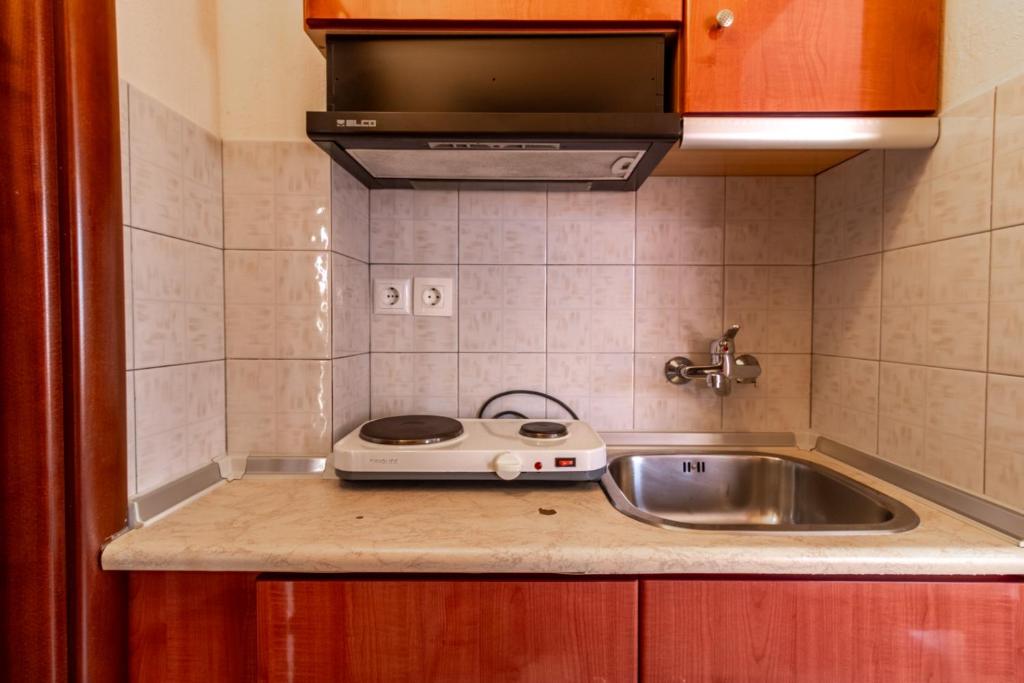 Kuchyňa alebo kuchynka v ubytovaní Iliadis House II
