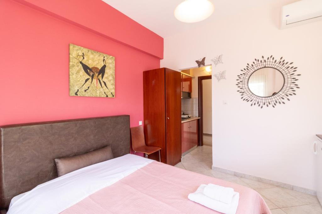 Posteľ alebo postele v izbe v ubytovaní Iliadis House II