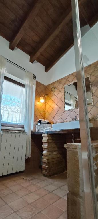 Kuchyň nebo kuchyňský kout v ubytování Villa Polercia