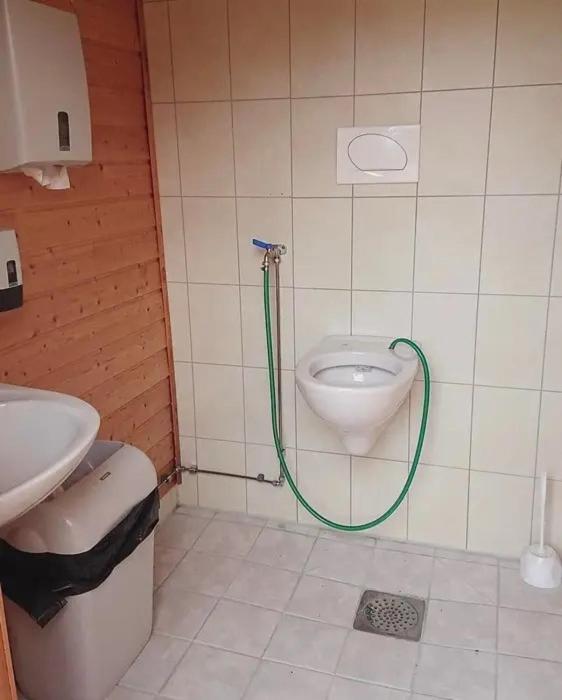 Koupelna v ubytování Tørfoss Gård, Hytte utleie, Campingvogn og bobil plasser