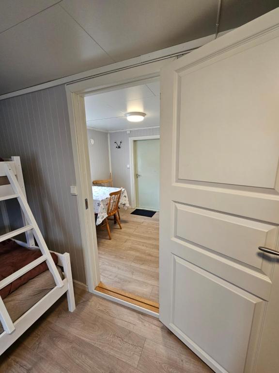 Postel nebo postele na pokoji v ubytování Tørfoss Gård, Hytte utleie, Campingvogn og bobil plasser