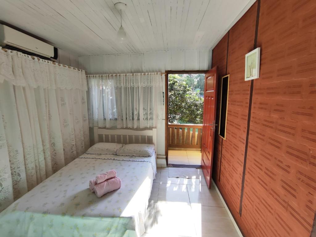 Cama ou camas em um quarto em Pousada Do Chicão