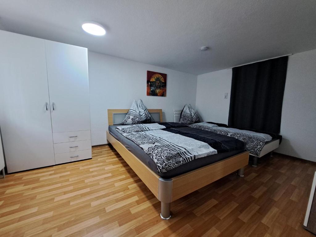 Postel nebo postele na pokoji v ubytování ZADRA Home