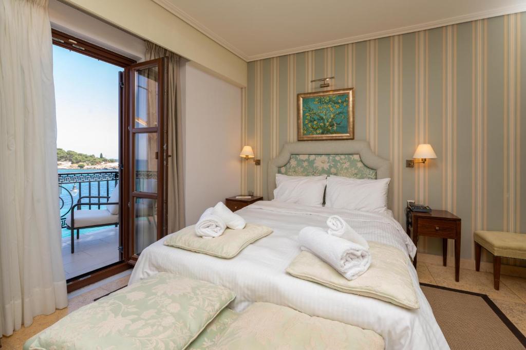 Postel nebo postele na pokoji v ubytování La Boheme Hotel