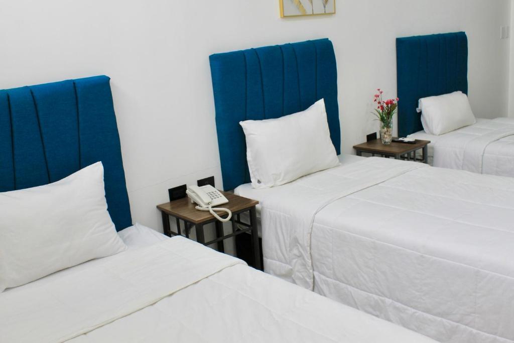 Postel nebo postele na pokoji v ubytování Hotel Presidente Internacional