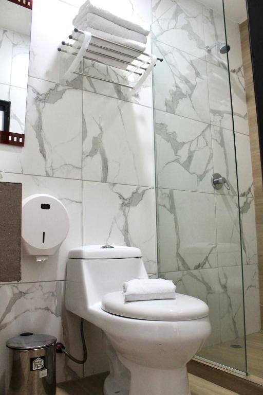 Koupelna v ubytování Hotel Presidente Internacional