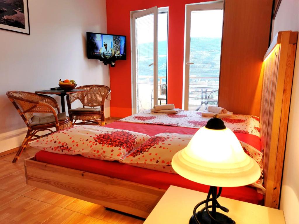 Postel nebo postele na pokoji v ubytování Durakovic Apartments