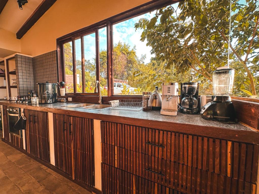 Kuchyň nebo kuchyňský kout v ubytování Villa Canopy Minca