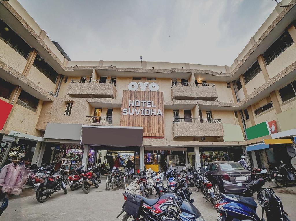 a group of motorcycles parked in front of a building at Collection O 45443 Hotel Suvidha in Bilāspur