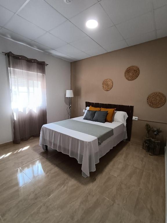 Postel nebo postele na pokoji v ubytování Casa Pili
