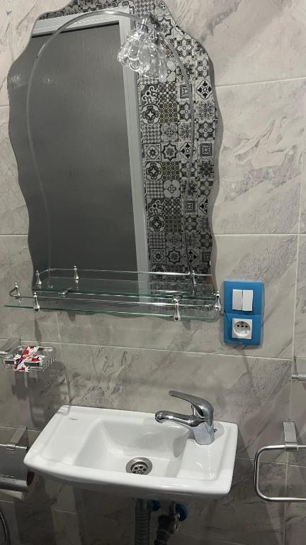 Koupelna v ubytování Hôtel Etoile de Mer
