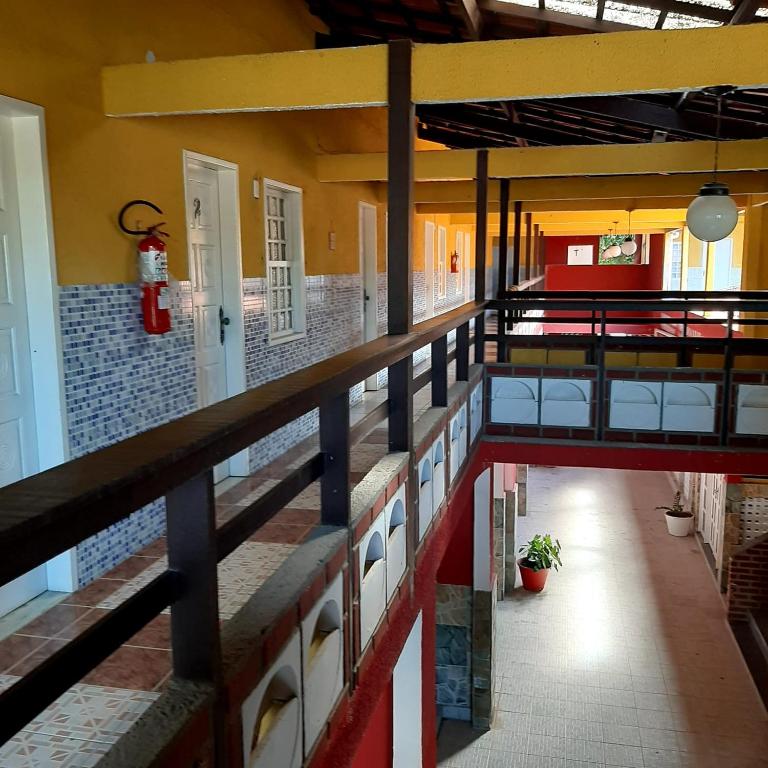 Postel nebo postele na pokoji v ubytování Pousada Canto de Guarajuba