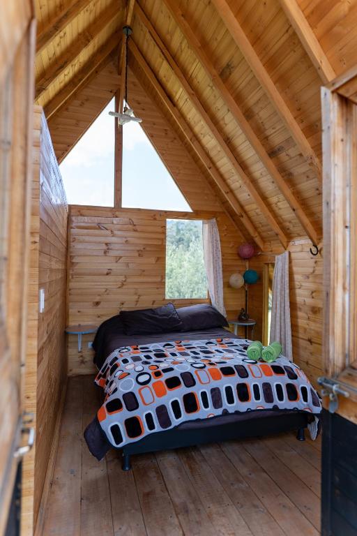 Postel nebo postele na pokoji v ubytování Glamping las 4 estaciones