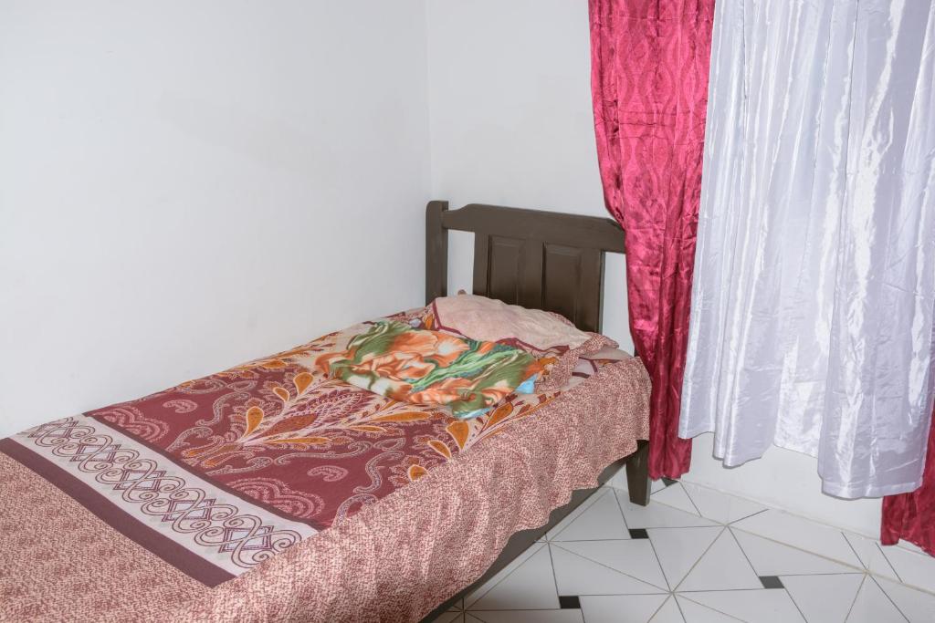 Postel nebo postele na pokoji v ubytování Casa/cabaña de montaña con ambiente fresco