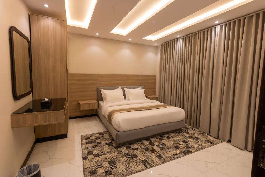 Postel nebo postele na pokoji v ubytování Elite House