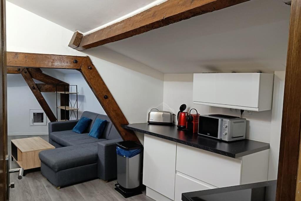 Photo de la galerie de l'établissement Détente - Appartement et poutres apparentes, à Béziers