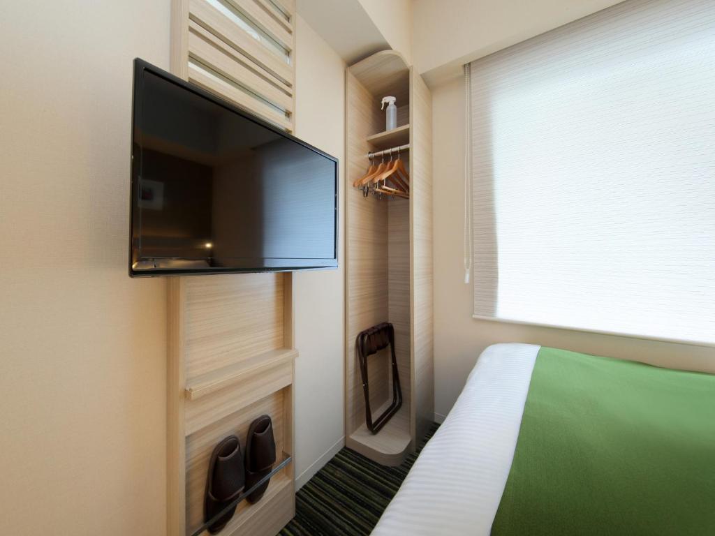 TV a/nebo společenská místnost v ubytování Keio Presso Inn Tokyo Station Yaesu