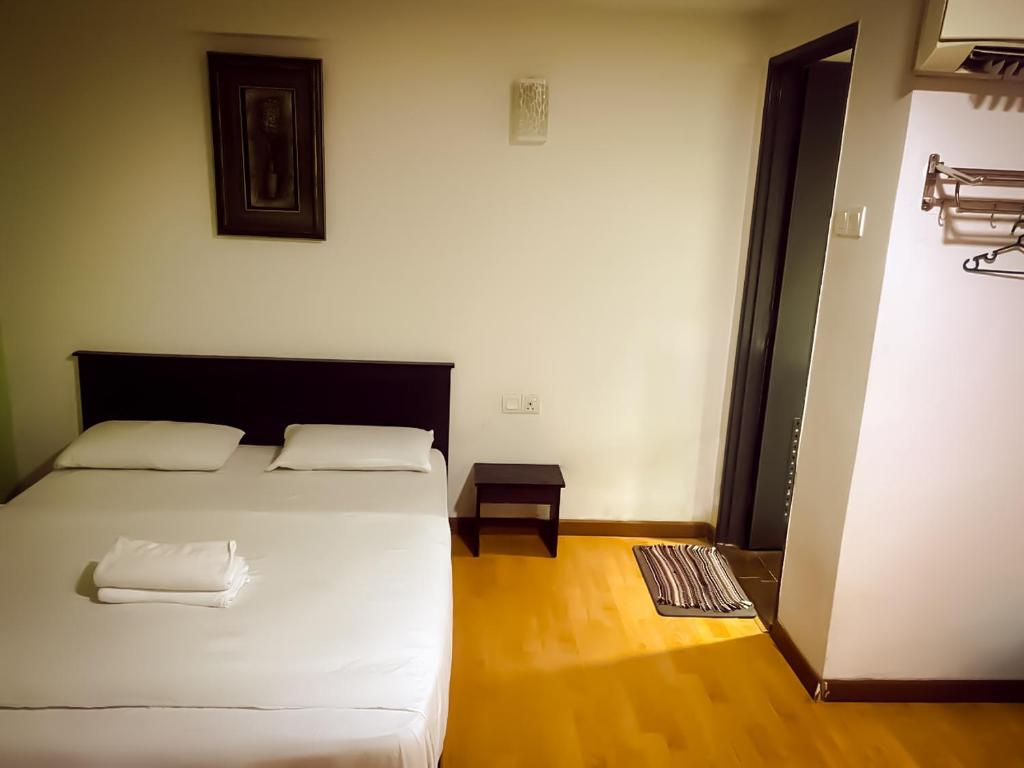 Postel nebo postele na pokoji v ubytování TM Hotel