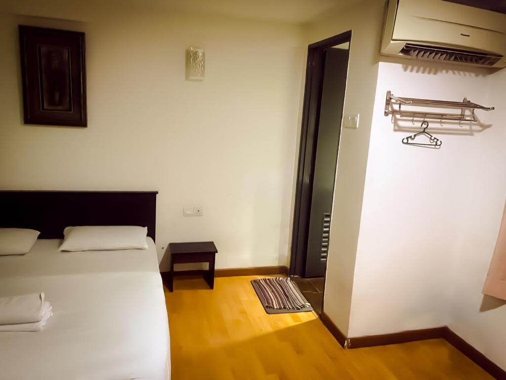 Postel nebo postele na pokoji v ubytování TM Hotel