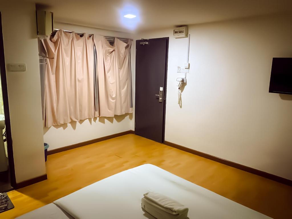 Postel nebo postele na pokoji v ubytování TM Hotel
