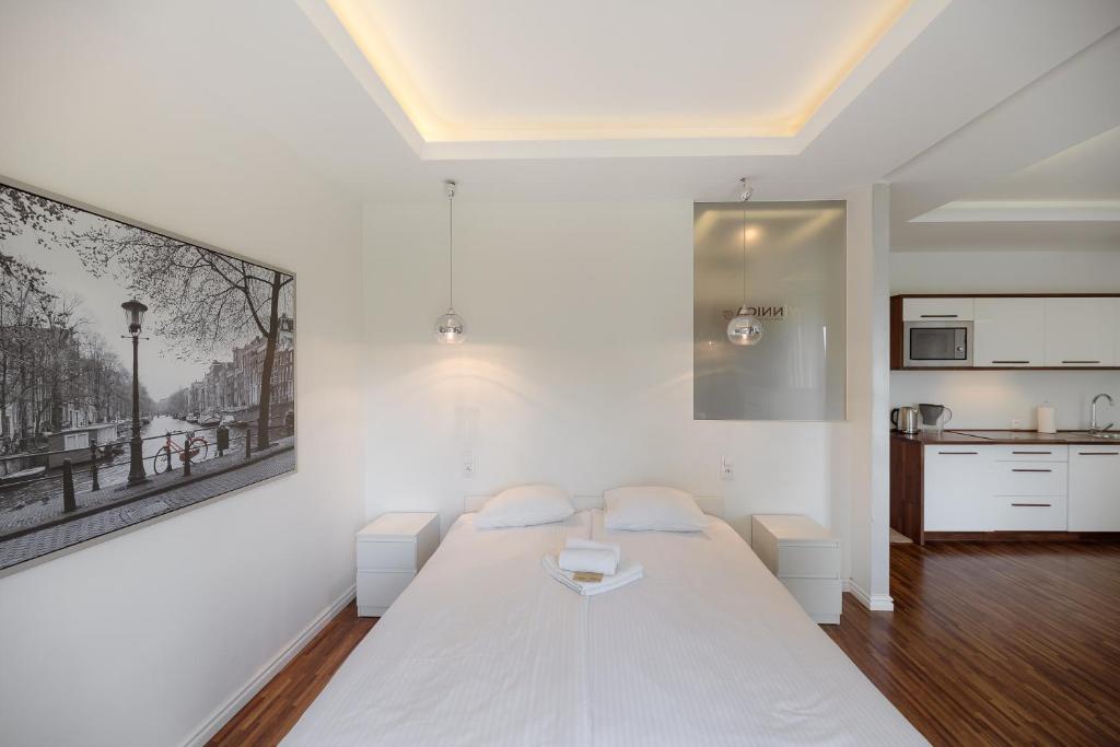 Posteľ alebo postele v izbe v ubytovaní Apartament Winnica Widok na Wisłę