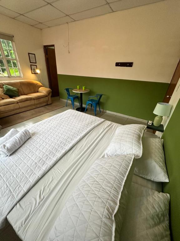Postel nebo postele na pokoji v ubytování Kilian Beach House