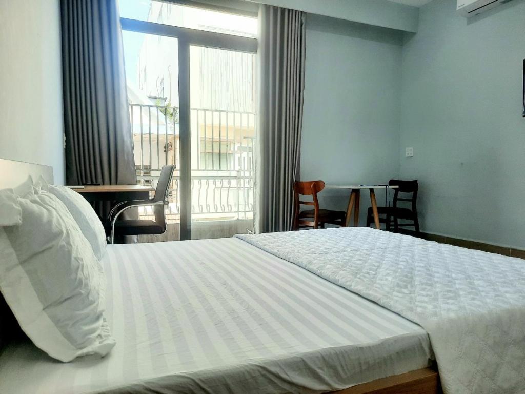 Postel nebo postele na pokoji v ubytování C - Home