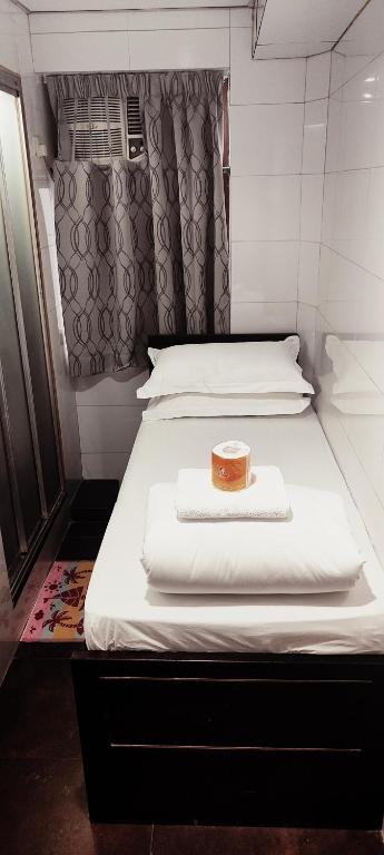 Letto o letti in una camera di Four Seasons Hostel