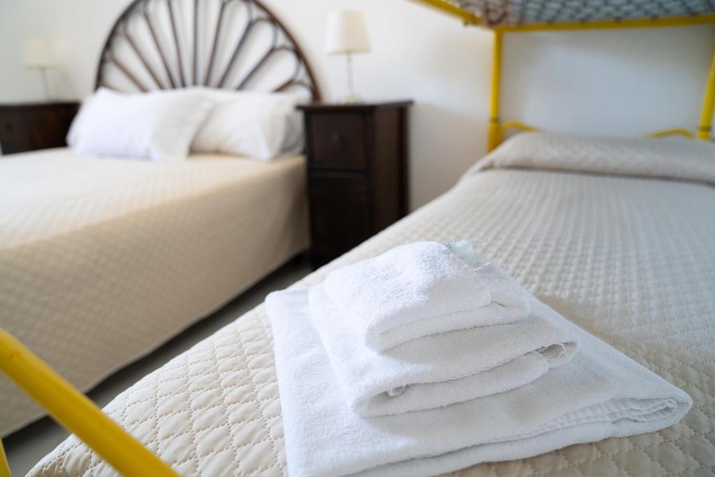 Postel nebo postele na pokoji v ubytování NIMA Holidays Home