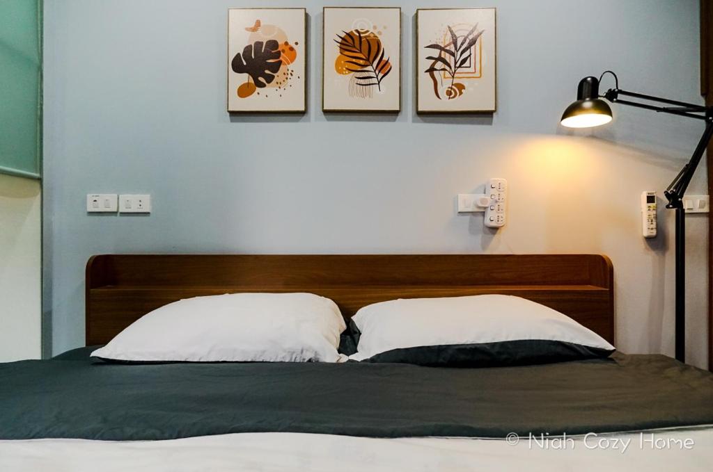 Postel nebo postele na pokoji v ubytování Niah Cozy Home - Train Street