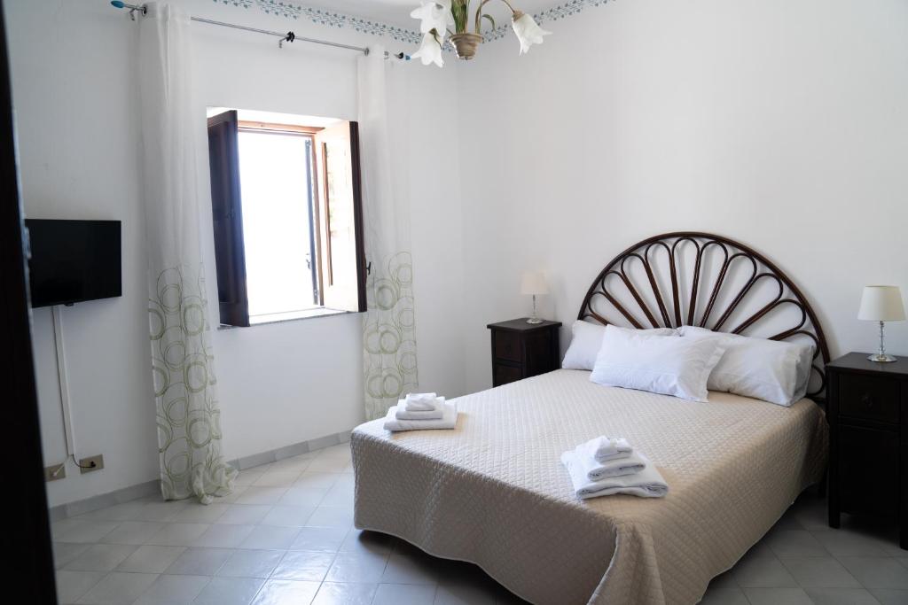 Postel nebo postele na pokoji v ubytování NIMA Holidays Home