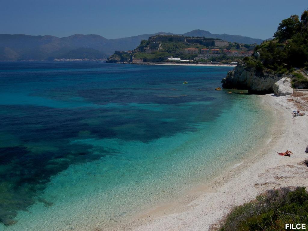 a view of a beach with the water at Residence Capobianco in Portoferraio