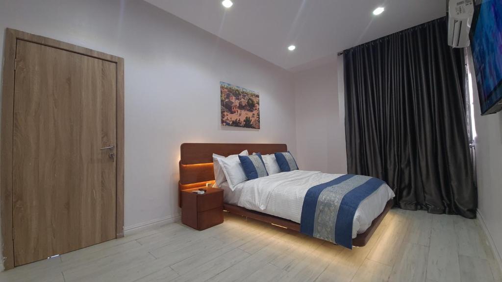 Postel nebo postele na pokoji v ubytování Seaview Apartment, Ikoyi