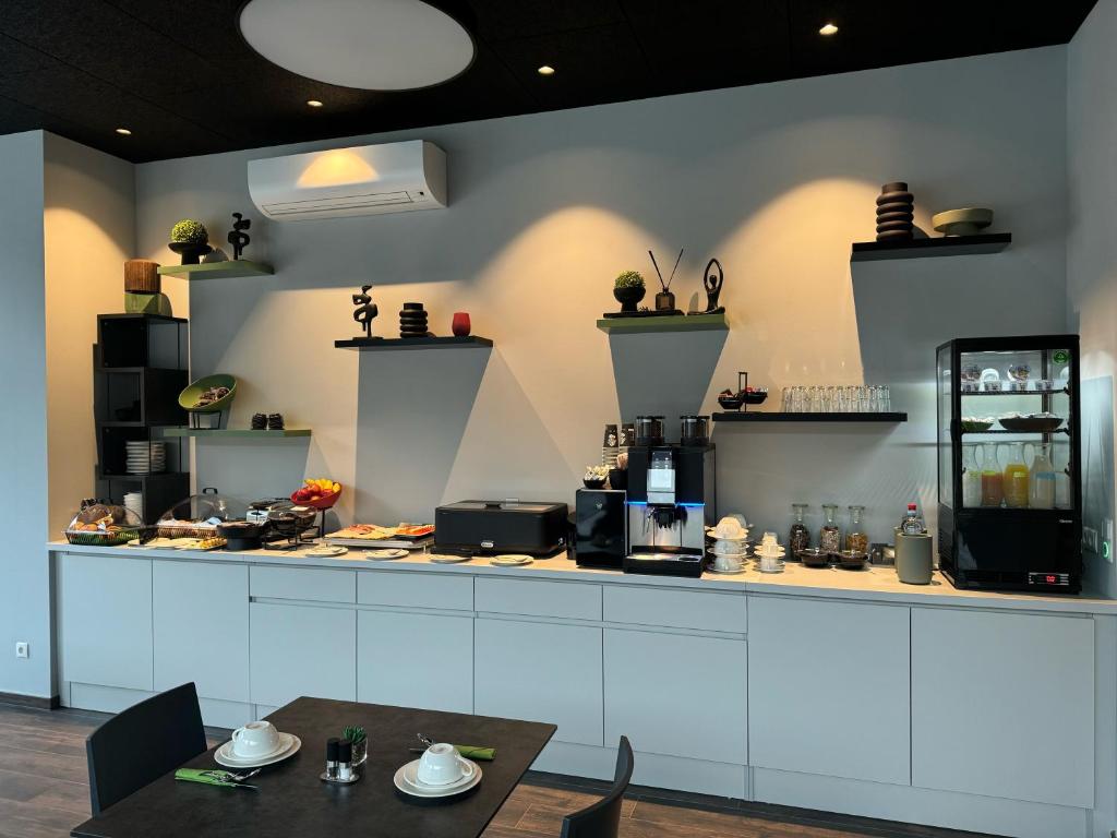 Kuchyň nebo kuchyňský kout v ubytování GuestHouse Große Linde