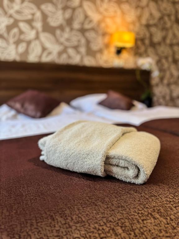Postel nebo postele na pokoji v ubytování Dom Wypoczynkowy Słoneczna